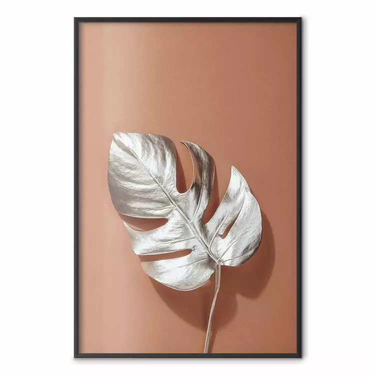 Sonnige Erinnerung - Monstera-Blatt auf hellem Grund