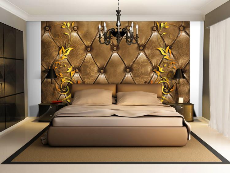 Fototapete Elegantes Design - Ledertextur mit goldenen Mustern und Blumen