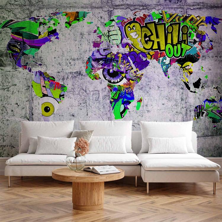 Welt des Graffiti - bunte Weltkarte auf Betonhintergrund für Teenager